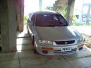 :  > Mazda Familia 1.5 Interplay-X (Car: Mazda Familia 1.5 Interplay-X)